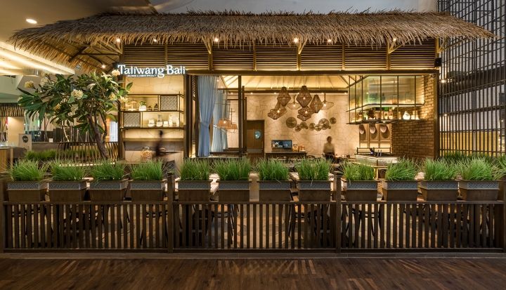 Charming, Tropical-Inspired Cafe with Inviting Design and Natural Elements