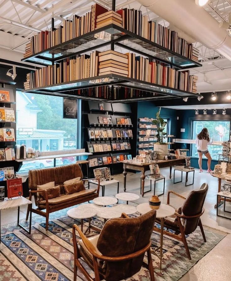 Cozy Cafe Design Merges Bookstore Ambiance with Inviting Comfort and Artistic Touches