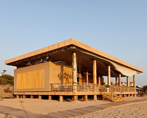 Beachfront Cafe Showcases Striking Architecture, Natural Materials, and Inviting Atmosphere