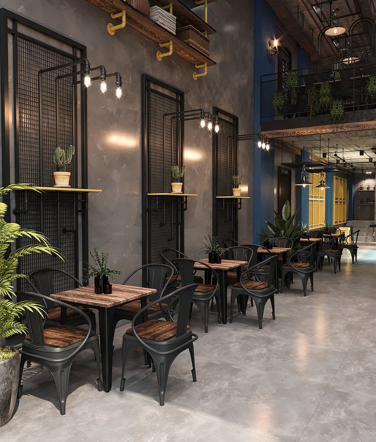 Modern Industrial Cafe Design: A Chic Blend of Metal, Wood, and Nature for an Inviting Atmosphere