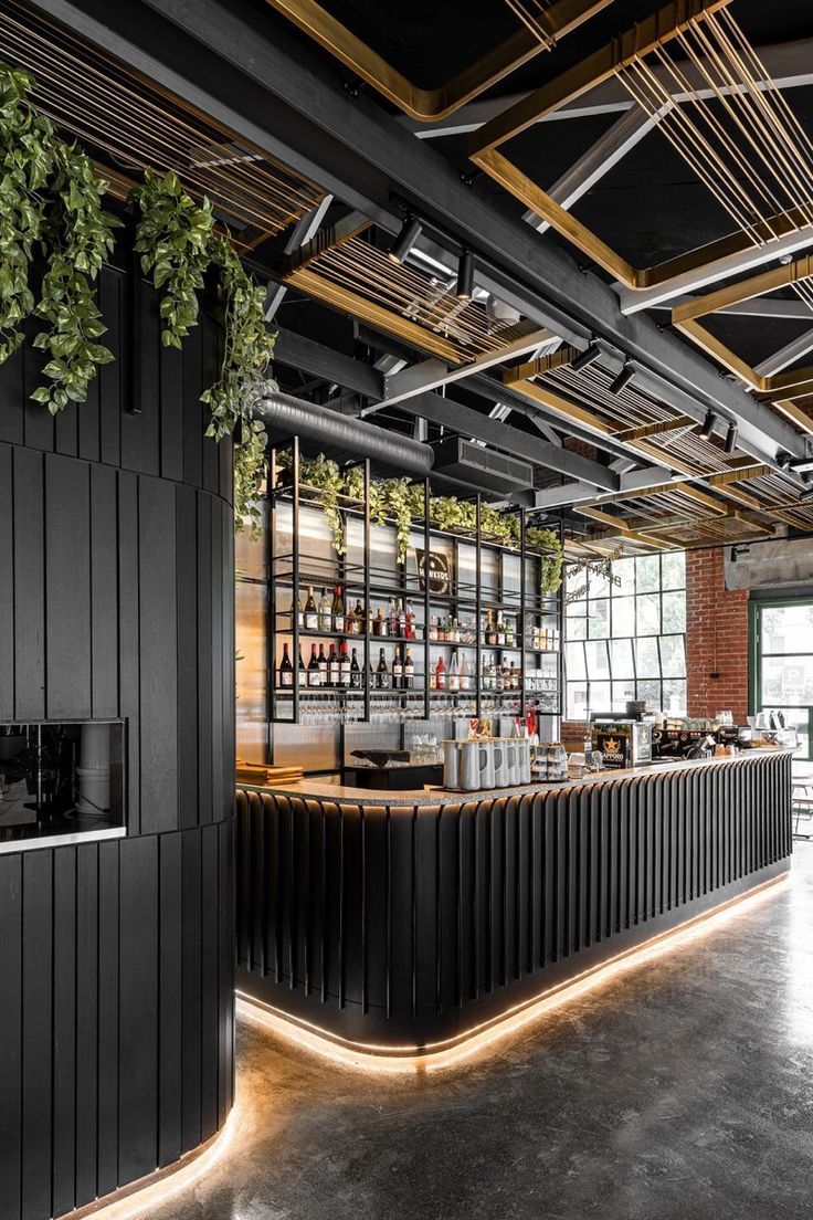 Modern Cafe Design: A Harmonious Blend of Dark Wood, Metallic Accents, and Inviting Ambience