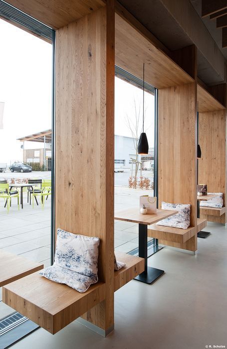 Modern Cafe Design: Inviting Aesthetics Blend Natural Light, Warm Wood, and Minimalist Comfort