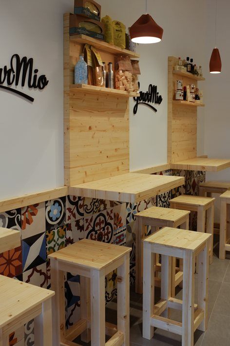 Charming Cafe Blends Rustic Wood and Colorful Tiles for a Contemporary, Inviting Atmosphere