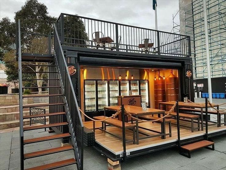 Trendy Shipping Container Cafe Blends Modern Design with Urban Warmth