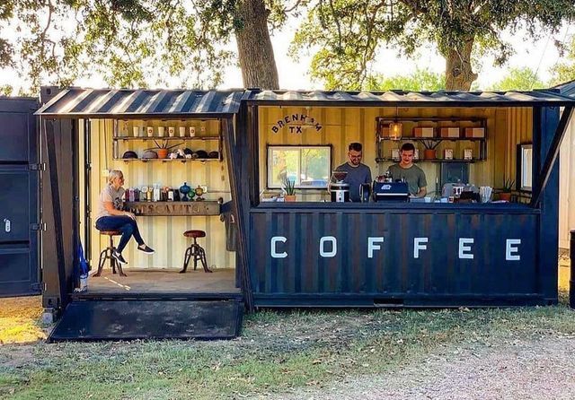 Modern Coffee Shop Design: A Converted Shipping Container with an Industrial Chic Aesthetic and Inviting Atmosphere