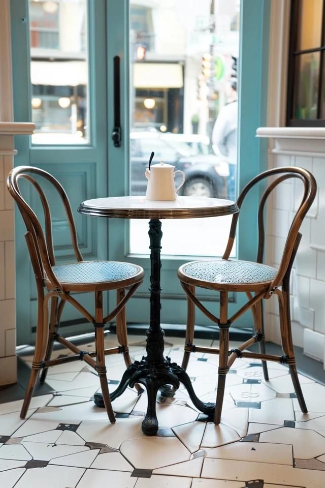 Charming Cafe Design: Cozy Corner with Elegant Bistro Furniture and Inviting Ambiance