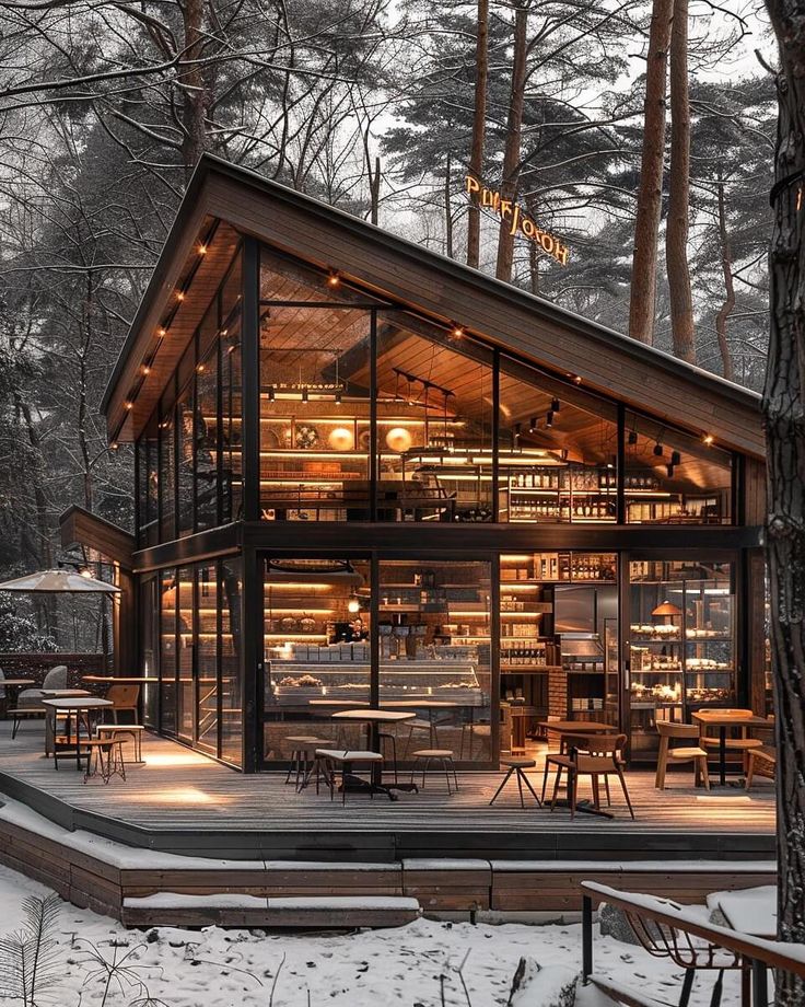 Modern Cafe Design Integrates Glass Facade, Inviting Wood Elements, and Scenic Outdoor Deck for a Cozy Atmosphere