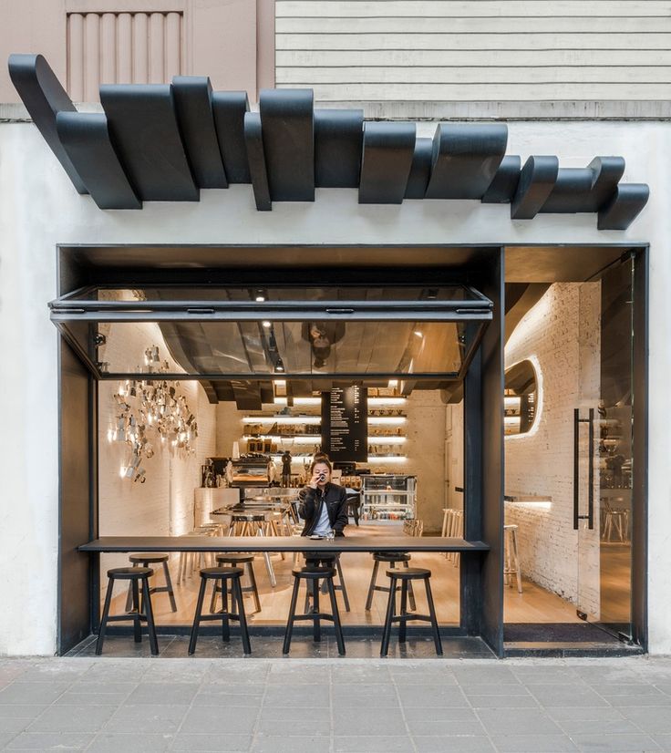 Modern Minimalist Cafe Design: A Harmonious Blend of Indoor-Outdoor Aesthetics and Elegant Comfort