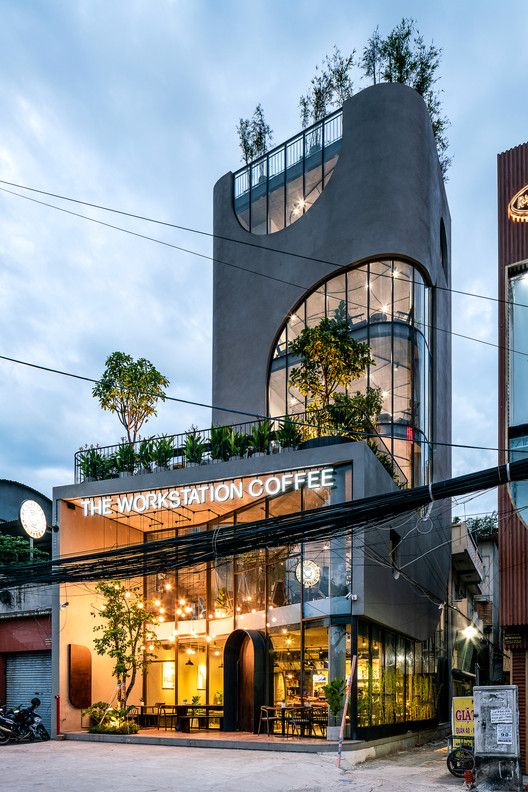 Modern Cafe Design: A Harmonious Blend of Sleek Architecture and Natural Elements