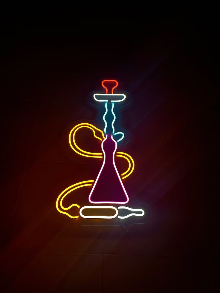 Vibrant Neon Hookah Design: Elevating Cafe Ambiance for Relaxation and Socialization