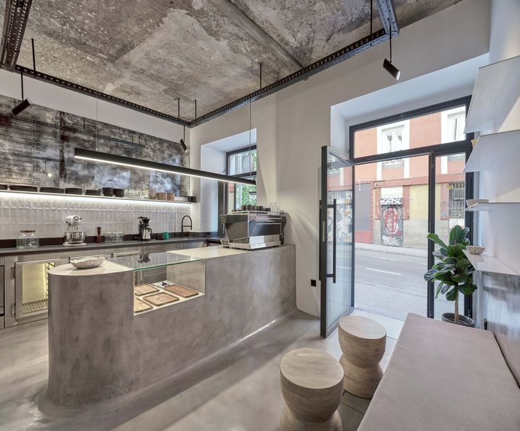 Modern Minimalist Cafe Design with Industrial Charm and Inviting Ambiance