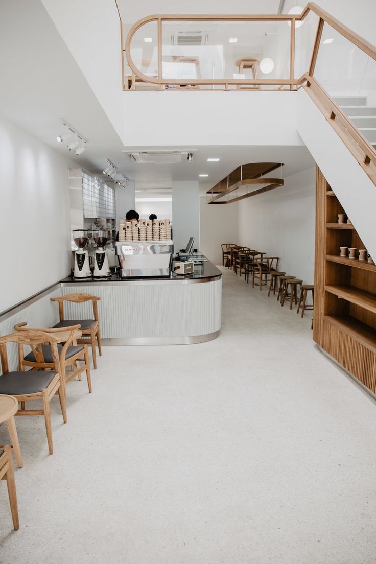 Modern Minimalist Cafe Design Fostering Warmth and Inviting Atmosphere