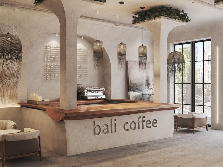 Minimalist Cafe Design: Inviting Atmosphere with Natural Elements and Contemporary Comfort