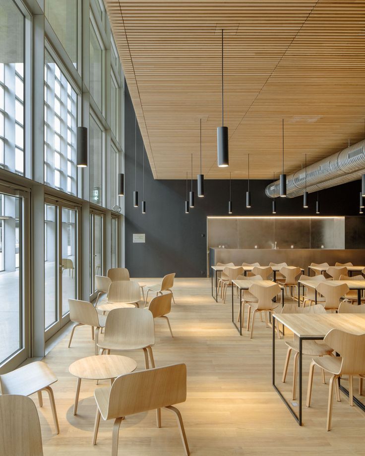 Modern Minimalist Cafe Design Emphasizing Natural Light and Inviting Ambiance