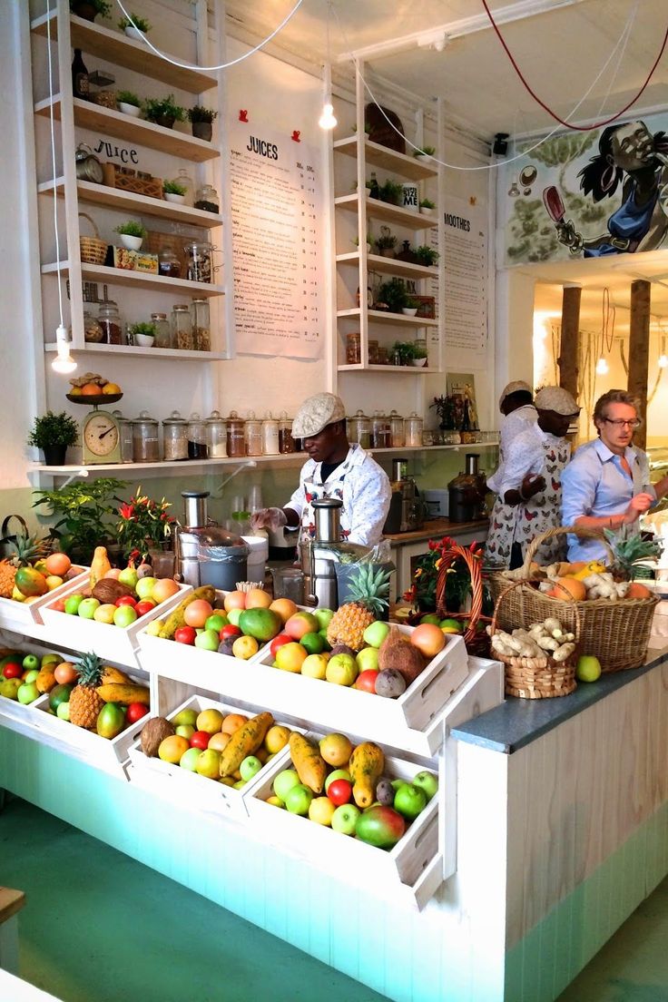 Vibrant Cafe Design Showcases Fresh Produce and Health-Focused Atmosphere