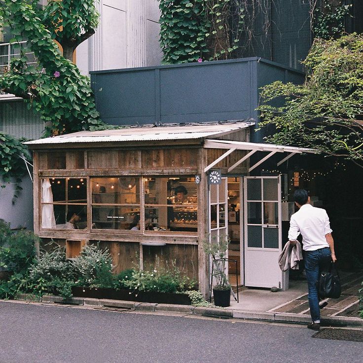 Charming Rustic Cafe Blends Seamlessly with Nature, Features Inviting Design and Cozy Outdoor Space