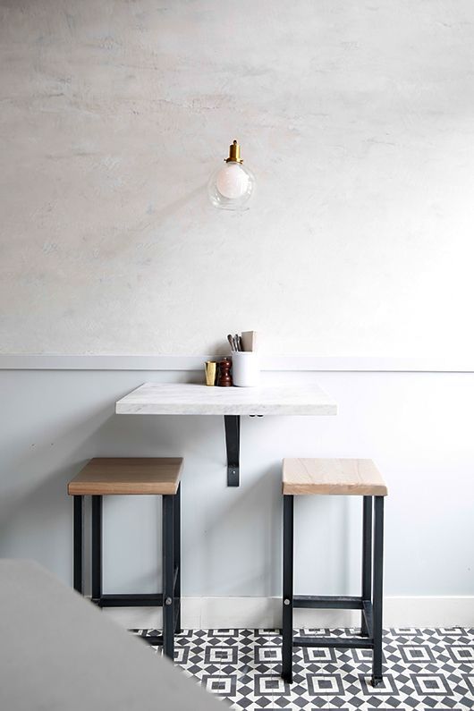 Minimalist Cafe Design with Cozy Ambiance and Inviting Aesthetics