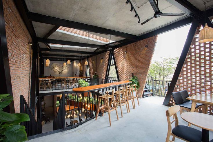 Cafe Design: A Harmonious Union of Industrial and Natural Elements