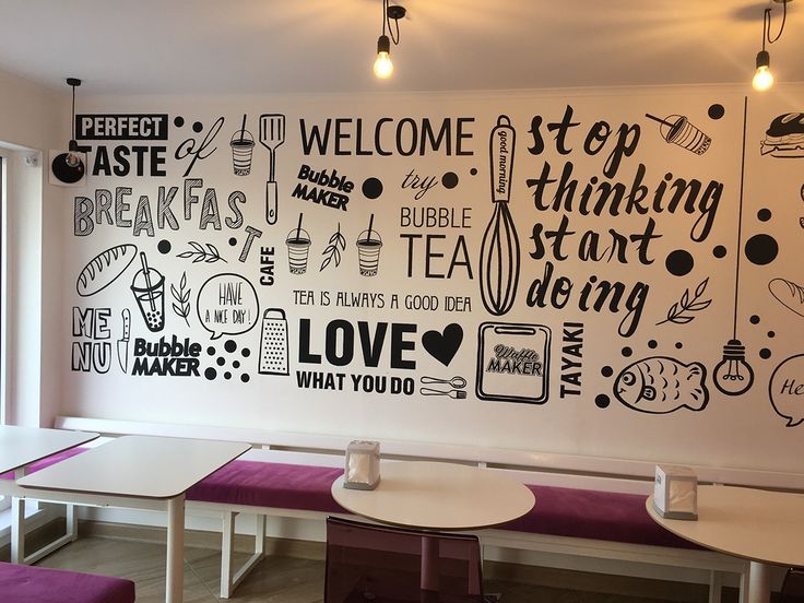 Vibrant Cafe Design: Energetic Aesthetic with Playful Murals and Modern Comfort