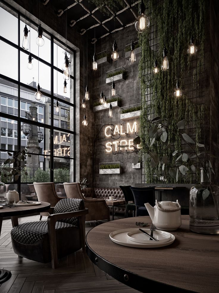 Inviting Cafe Design Blends Industrial Charm with Natural Elements for a Serene Atmosphere