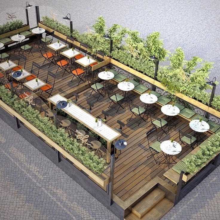 Inviting Outdoor Cafe Design: A Harmonious Blend of Table Styles, Warmth, and Nature