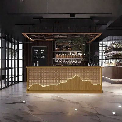 Modern Cafe Design with Sleek Aesthetic, Illuminated Wooden Counter, and Inviting Atmosphere