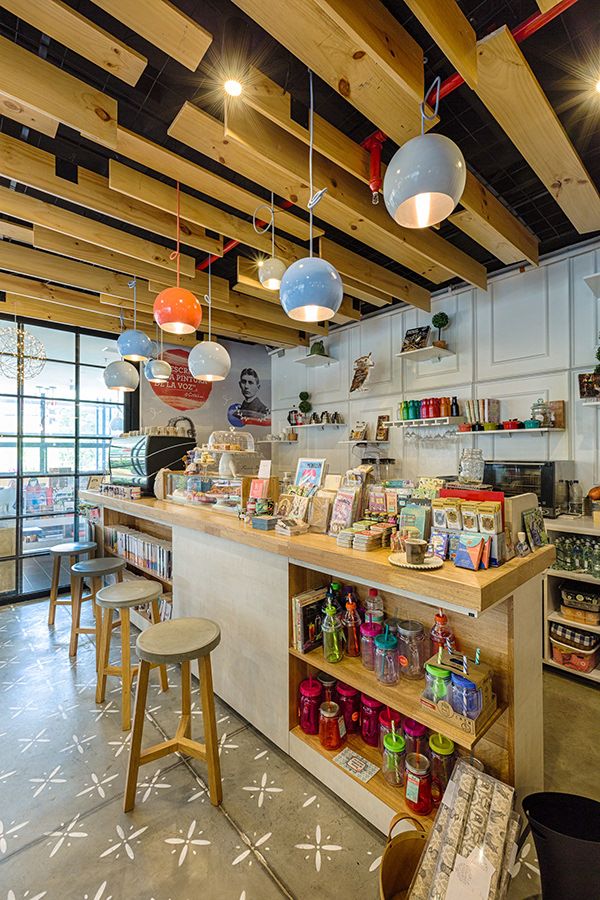 Cozy Cafe Design Emphasizing Natural Materials and Vibrant Aesthetics