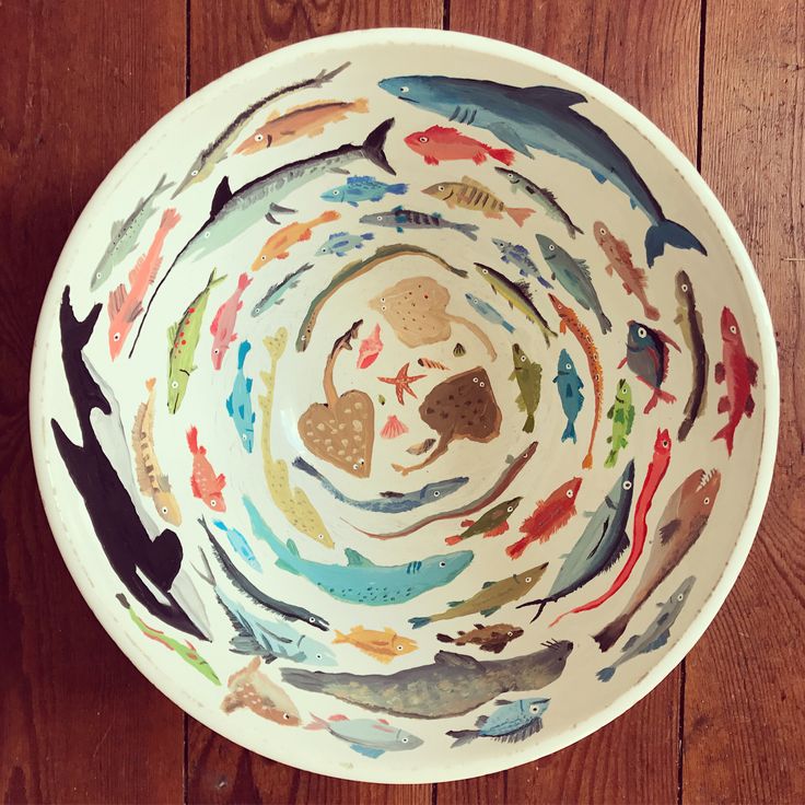 Vibrant Whimsical Bowl Design Showcasing Diverse Aquatic Life in a Spiraling Pattern