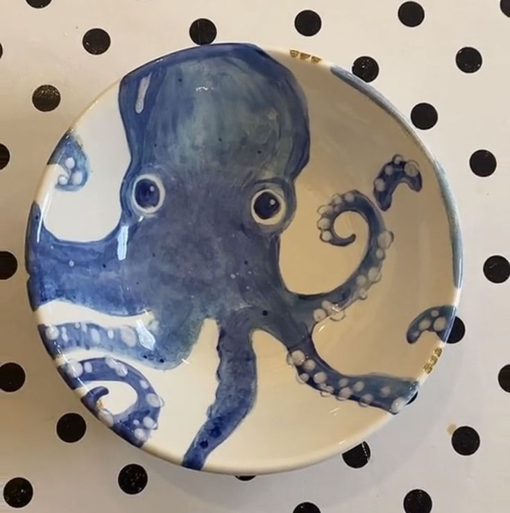 Whimsical Blue Octopus Plate Enhances Cafe Ambiance with Nautical Charm