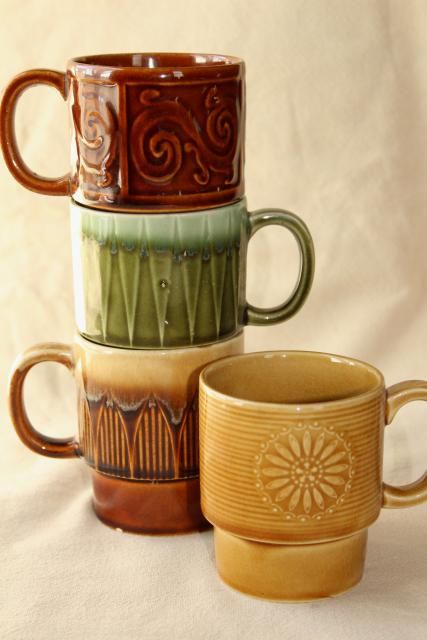 Artisanal Ceramic Mug Stack Enhances Cafe Ambiance with Distinctive Designs