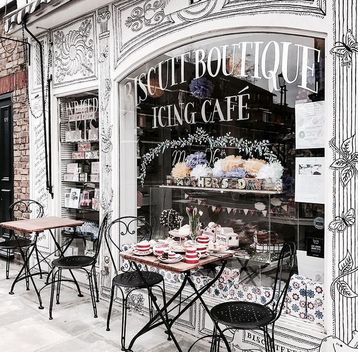 Charming Cafe Blends Vintage and Modern Aesthetic with Whimsical Design and Cozy Outdoor Seating