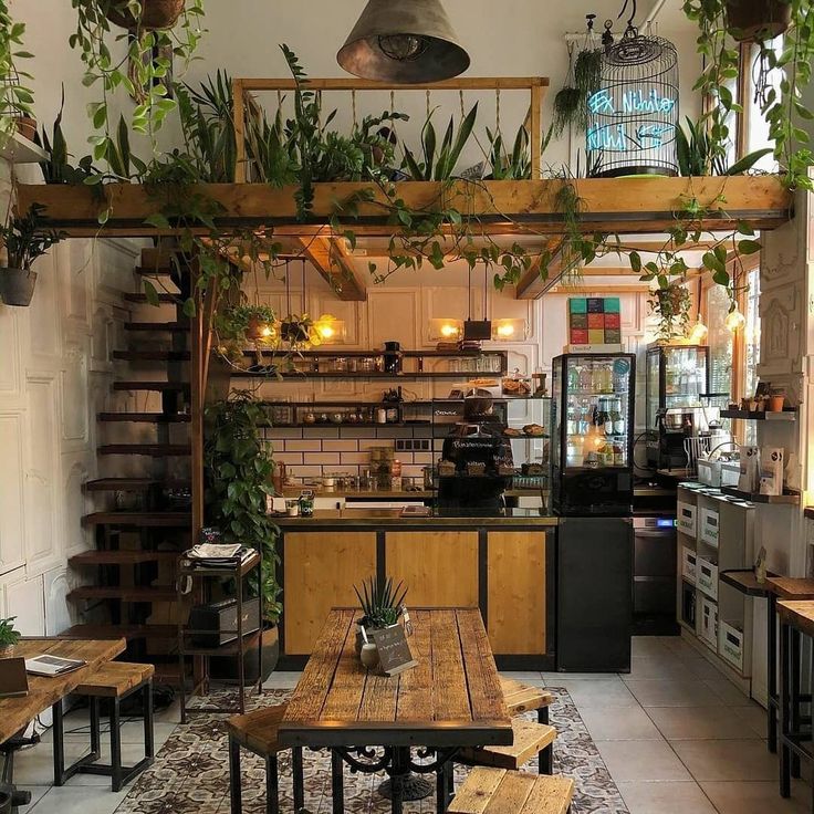 Charming Cafe with Inviting Design and Cozy Atmosphere Featuring Natural Elements and Modern Industrial Touches