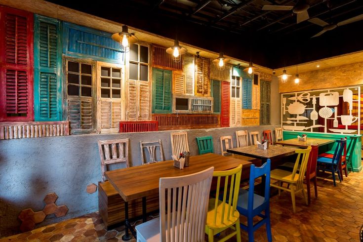 Eclectic Cafe Design Blends Vibrant Aesthetics with Rustic Charm for a Unique Dining Experience