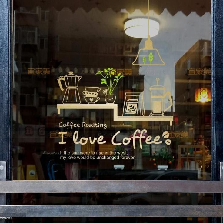 Inviting Cafe Design Blends Modern Aesthetics with Rustic Charm through Artful Window Display