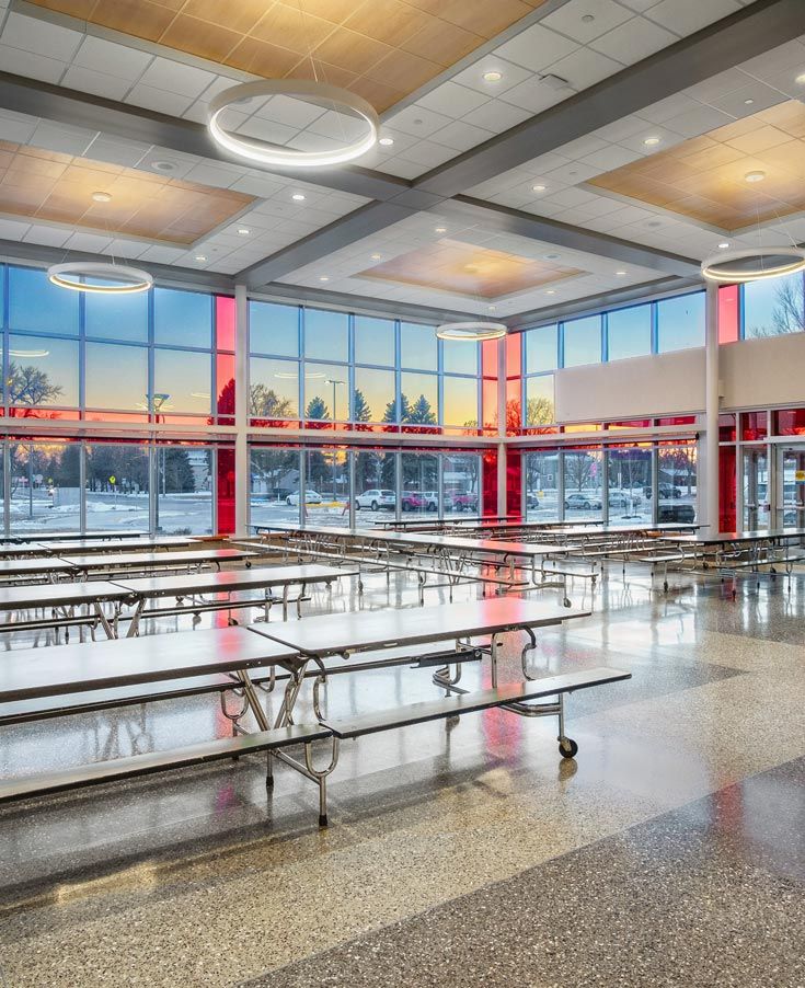 Bright and Versatile Cafe Design with Modern Aesthetics and Flexible Seating