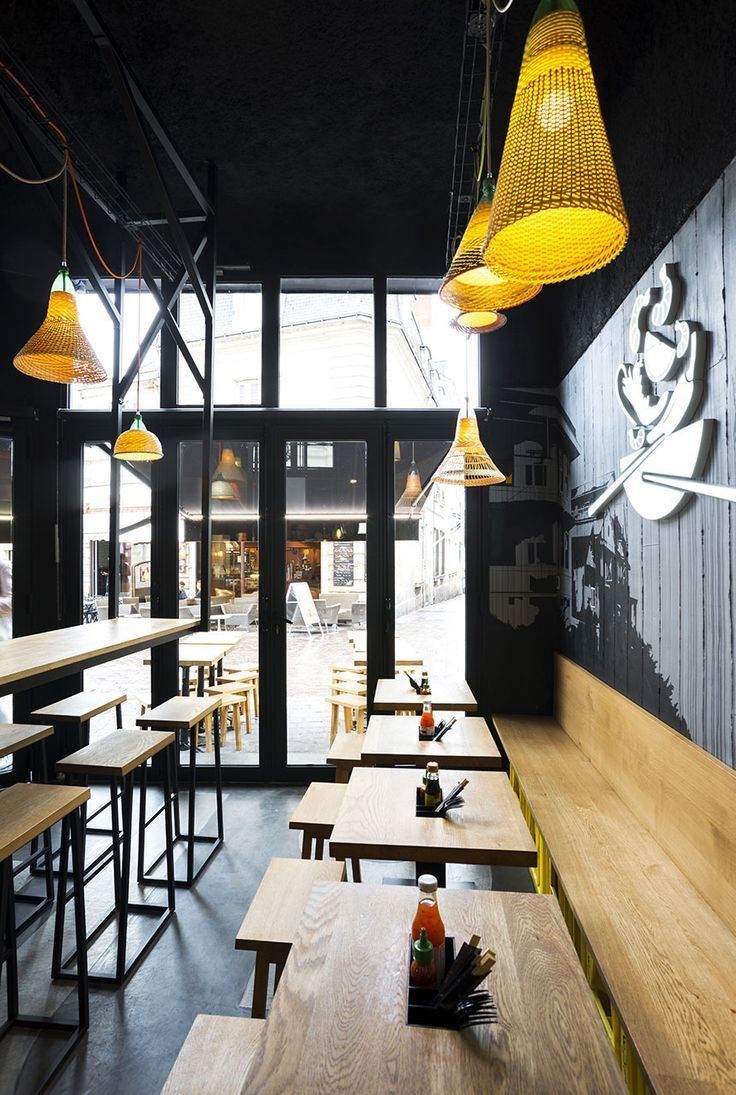 Modern Minimalist Cafe Design Blends Wood, Industrial Accents, and Inviting Atmosphere