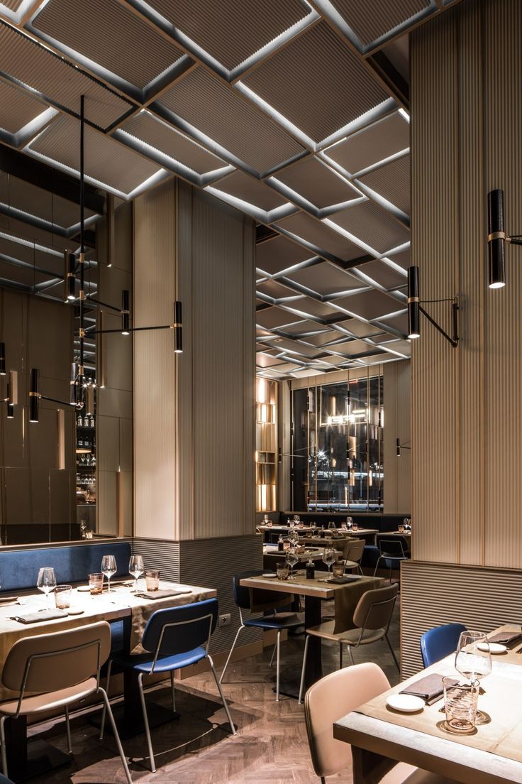 Sophisticated Modern Cafe Design: A Harmonious Blend of Materials, Lighting, and Comfort