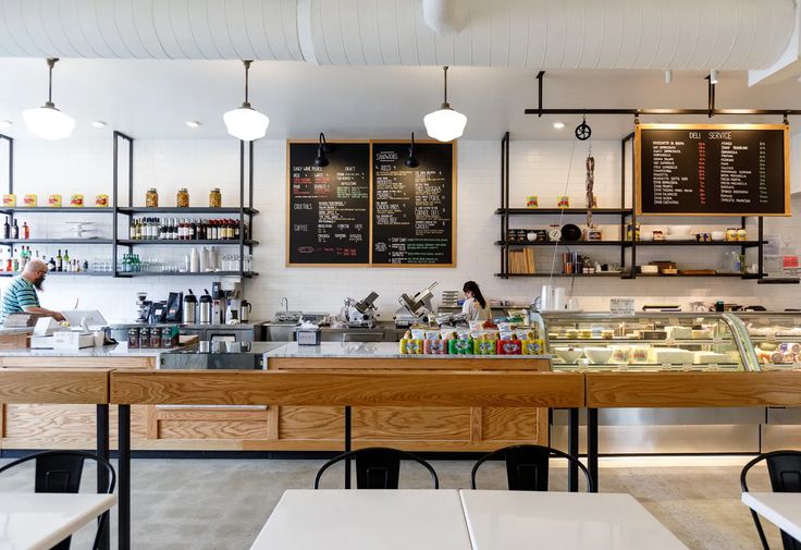 Modern Cafe Design: Bright Atmosphere with Minimalist Aesthetics and Inviting Seating