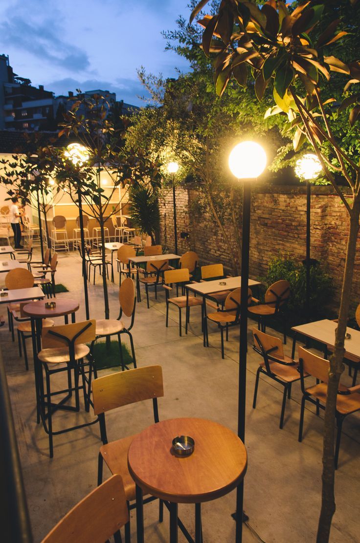 Charming Outdoor Cafe Design Blending Natural Elements with Contemporary Aesthetics