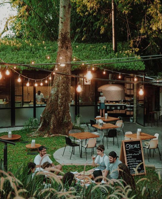 Inviting Outdoor Cafe Oasis: A Relaxed Atmosphere Amidst Nature's Harmony