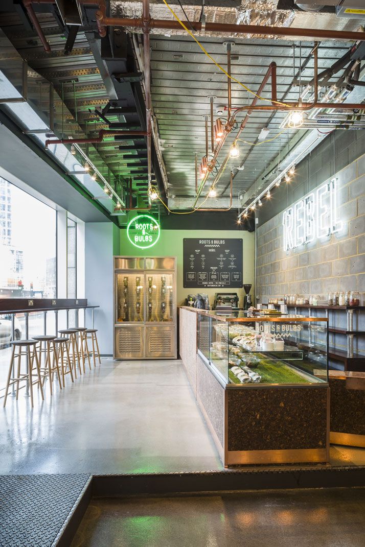 Modern Industrial Cafe Design: Polished Concrete, Exposed Ceilings, and Inviting Ambiance