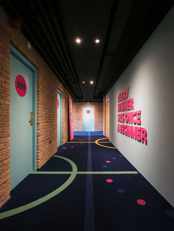 Vibrant Modern Hallway Design Blends Texture and Color for an Inviting Creative Cafe Atmosphere