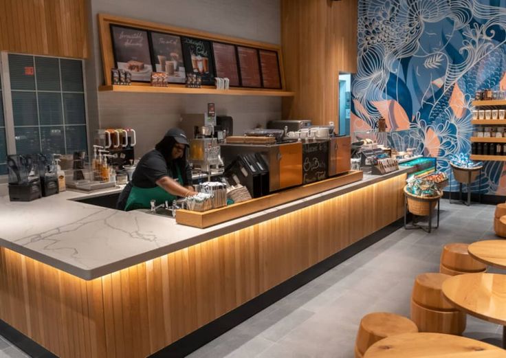 Inviting Cafe Design Blends Modern and Natural Elements with Artistic Flair