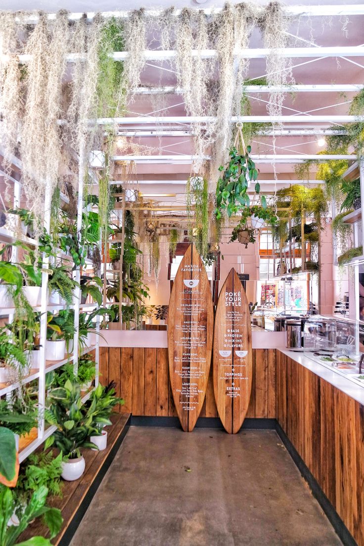 Tropical-Inspired Cafe Design with Vibrant Greens and Modern Aesthetics