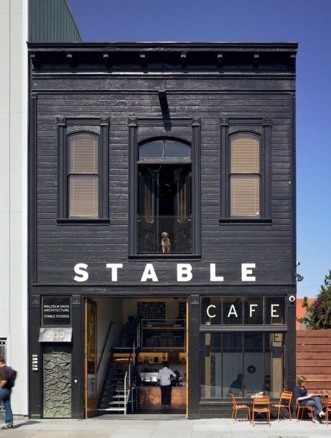 Modern Rustic Cafe Design Featuring Striking Facade and Inviting Atmosphere