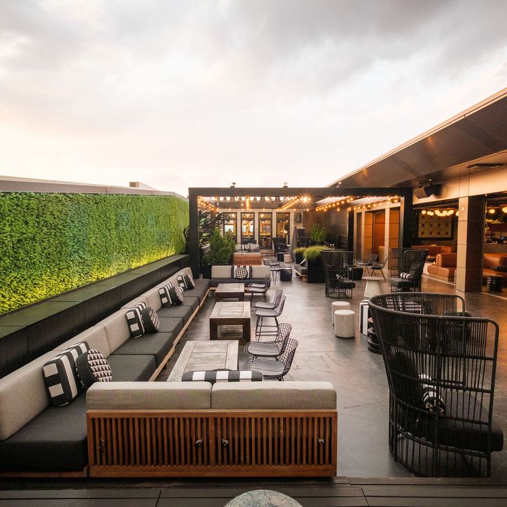 Stylish Rooftop Cafe: A Chic Blend of Modern Comfort and Natural Elements