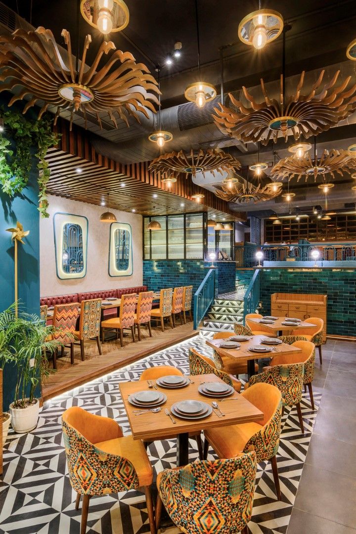 Vibrant Cafe Design: A Harmonious Blend of Geometric Patterns, Warm Colors, and Natural Elements