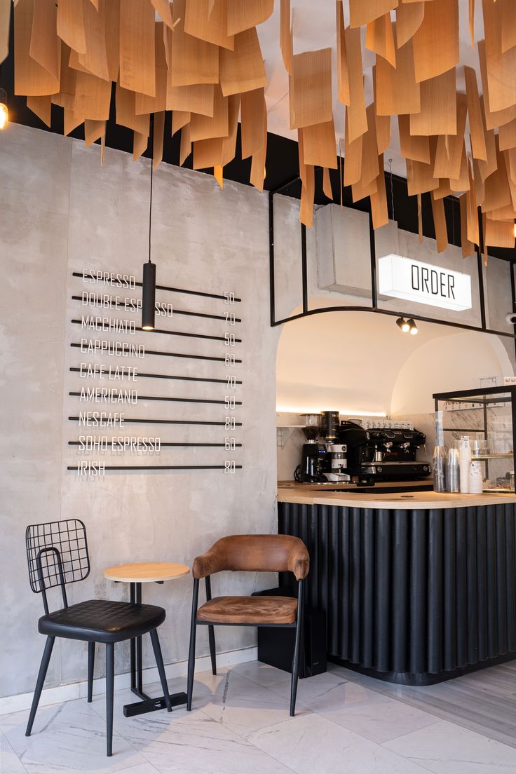 Modern Minimalist Cafe Design: A Cozy Blend of Concrete and Wood