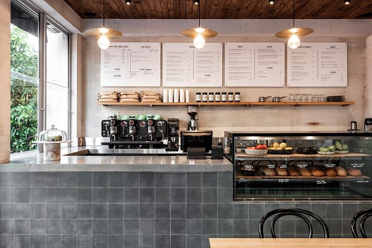 Modern Minimalist Cafe Design: Sleek Elements, Artisanal Focus, and Inviting Atmosphere