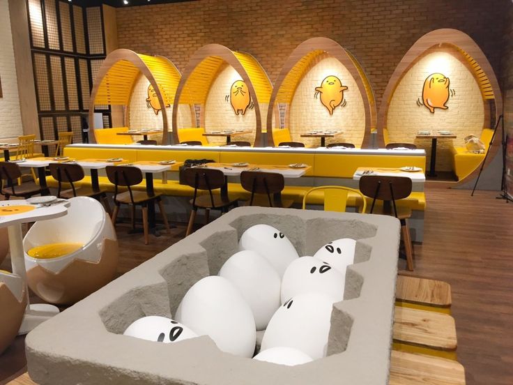 Whimsical Cafe Design with Egg-Themed Decor and Cozy Seating for All Ages